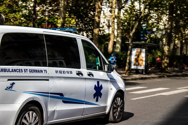 Paris, France - September 05, 2022 Ambulance driving through the streets of Paris during the coronavirus outbreak hitting France
