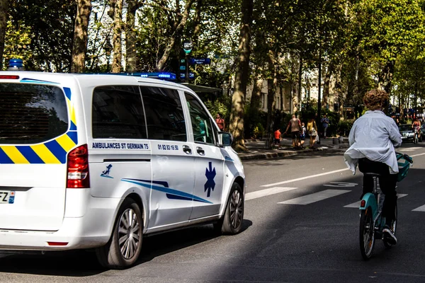 Paris, France - September 05, 2022 Ambulance driving through the streets of Paris during the coronavirus outbreak hitting France