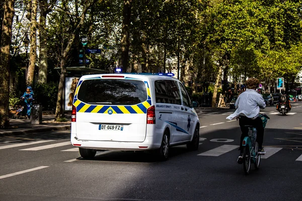Paris, France - September 05, 2022 Ambulance driving through the streets of Paris during the coronavirus outbreak hitting France