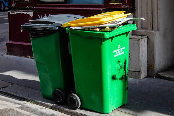 Paris, France - September 05, 2022 Garbage container in the downtown area of Paris, an emblematic city and the capital of France