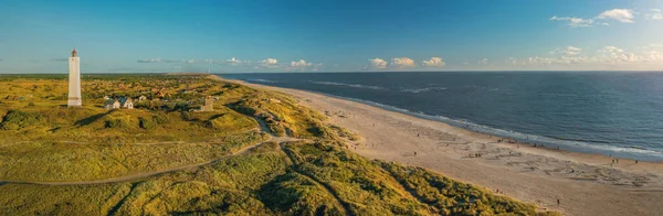  Panoramic view of Blvand lighthouse on wide dune of Blvandshuk with beach view on the west coast of Jutland, by Esbjerg, Denmark.