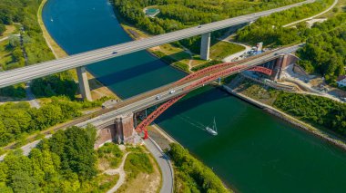 Panorama aerial view of the Levensau High Bridge that spans the Kiel Canal in Kiel-Suchsdorf , Schleswig-Holstein, Germany. Preparation work for replacement of the first Levensau high bridge. 