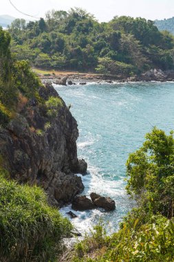 Beautiful view point of tropical sea and island with mountain cliff and rocks in Noen Nangphaya View Point in Chanthaburi, Thailand.