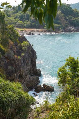 Beautiful view point of tropical sea and island with mountain cliff and rocks in Noen Nangphaya View Point in Chanthaburi, Thailand.