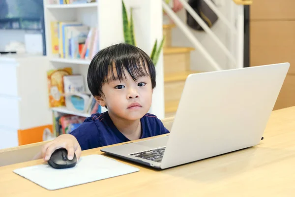 Home school boy learning with Laptop, Studies at Home, Distance Learning Online Education Homeschooling