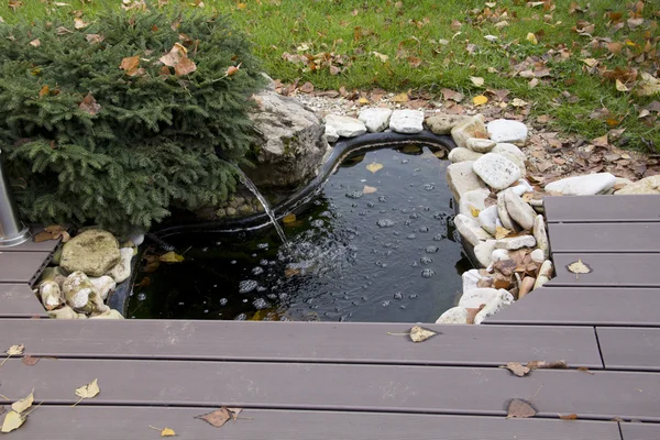 A small artificial pond at the site — Stock Photo, Image