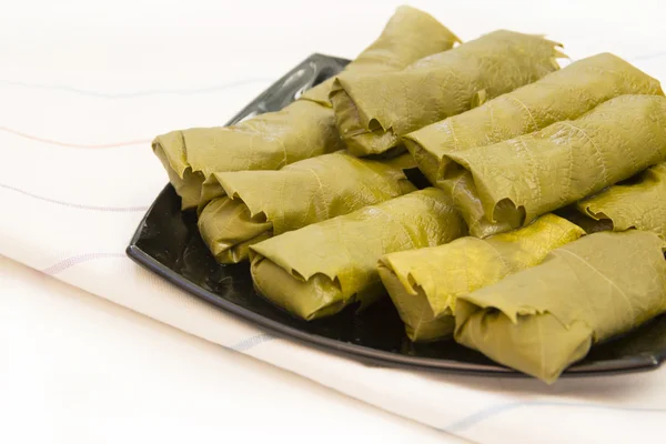Cabbage rolls in vine leaves — Stock Photo, Image