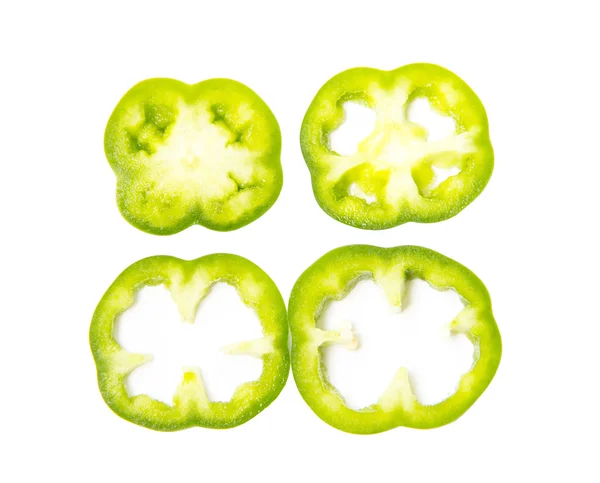 Slices of green peppers on white background — Stock Photo, Image