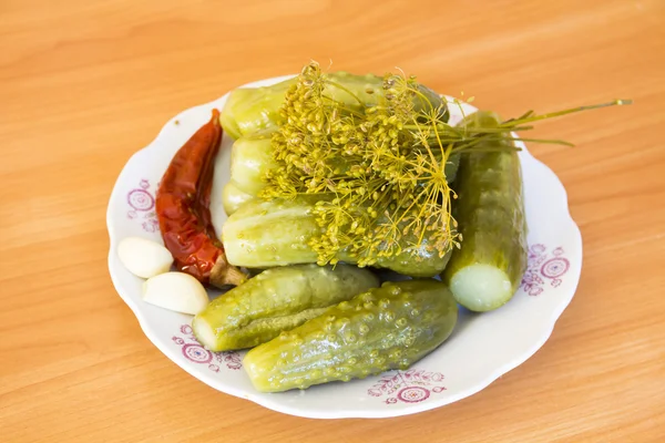 Pickles and spices on a plate — Stock Photo, Image