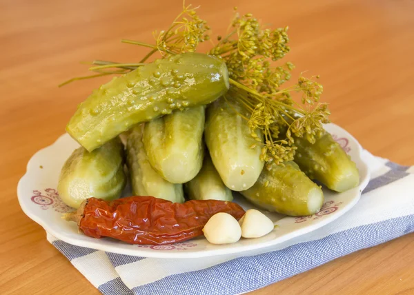 Pickles and spices on a plate Royalty Free Stock Images