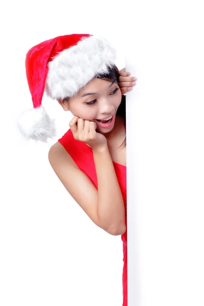 Christmas young girl showing blank billboard — Stock Photo, Image