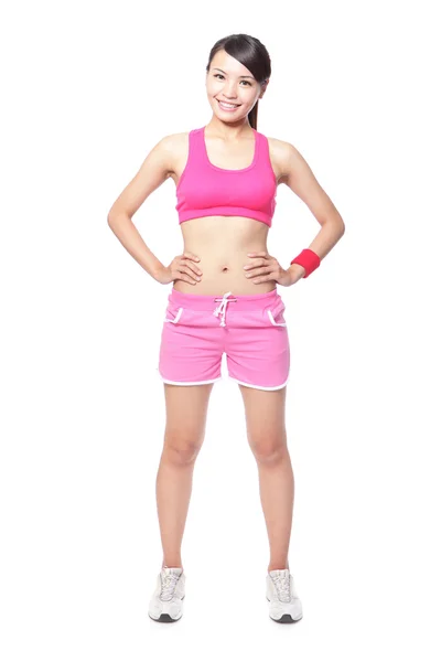 Mujer fitness sonrisa poner las manos en la cintura — Foto de Stock