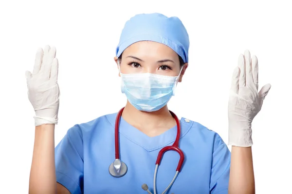 Woman doctor wearing medical gloves — Stock Photo, Image