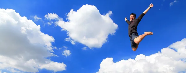 Happy young Man jumping — Stock Photo, Image