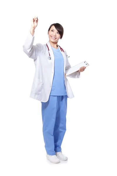 Sonriente doctora tocando algo — Foto de Stock