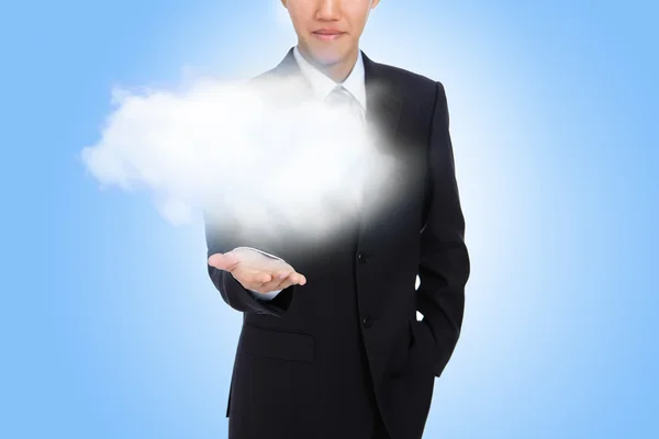 Business man hand holding white cloud — Stock Photo, Image