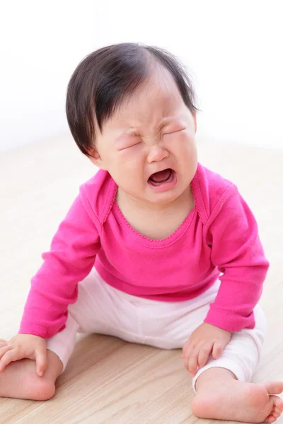 泣いている女の赤ちゃんの肖像画 ロイヤリティフリーのストック写真