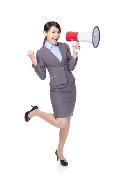 Donna d'affari felice con un megafono — Foto Stock