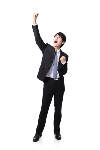 Excited business man with arms raised — Stock Photo, Image