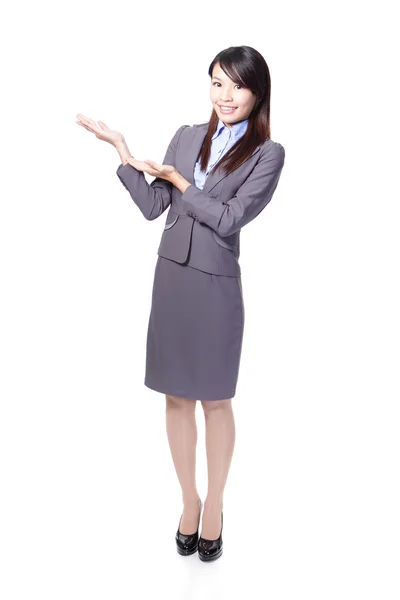 Smiling business woman presenting — Stock Photo, Image