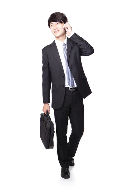 Business man Walking and speaking mobile phone — Stock Photo, Image