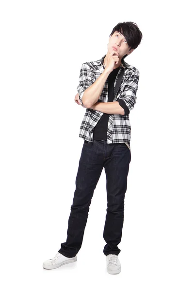 Casual young man thinking — Stock Photo, Image