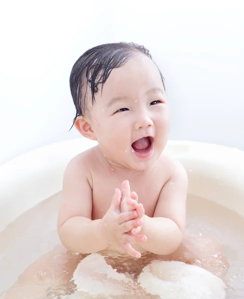 Baby girl excited taking a relaxing bath — Stock Photo, Image