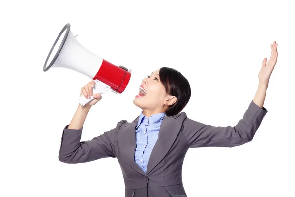 Business woman screaming in megaphone — Stock Photo, Image