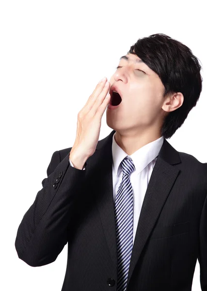 Overworked business man yawning — Stock Photo, Image