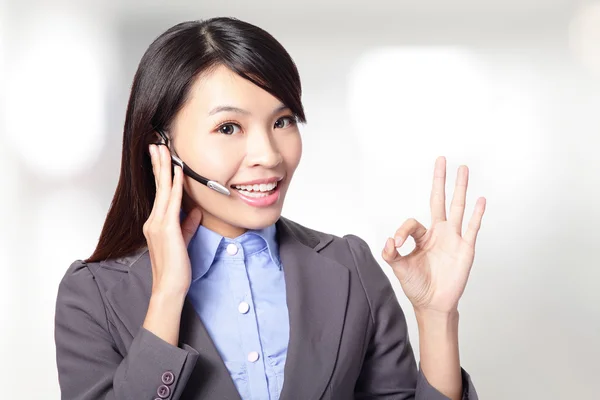 Mooie klant dienst exploitant vrouw met hoofdtelefoon Stockfoto