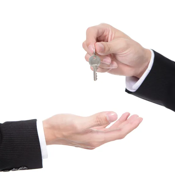 Male hand holding apartment keys Royalty Free Stock Images