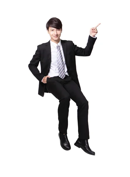 Business man sitting on some thing and show copy space — Stock Photo, Image