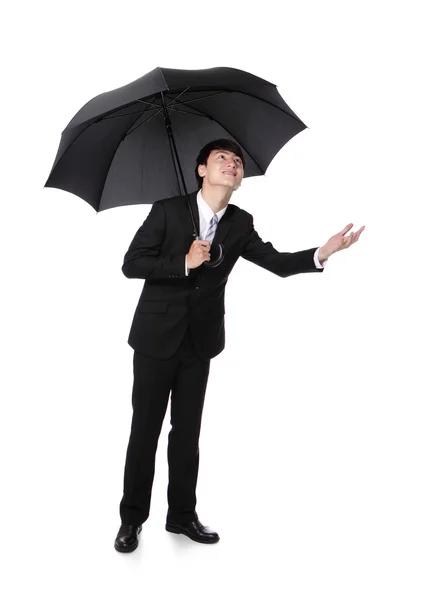 Business Man with an umbrella Stock Photo