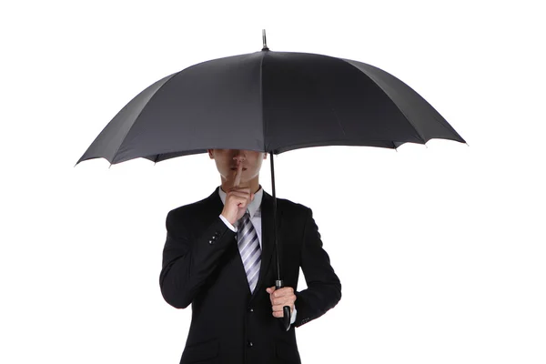 Business man asking for silence with umbrella Royalty Free Stock Photos