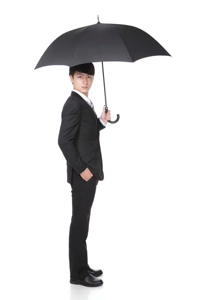Homme d'affaires avec un parapluie — Photo
