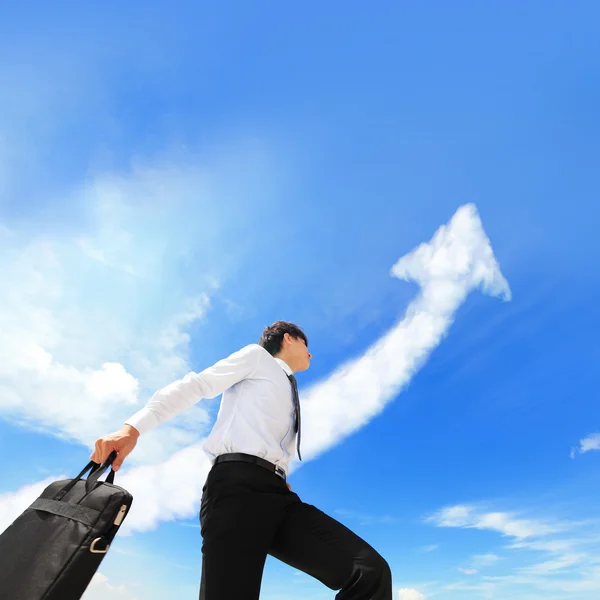 Happy successful business man run with arrow cloud — Stock Photo, Image