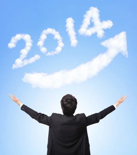 Biznes człowiek uścisk szczęśliwego nowego roku 2014 — Zdjęcie stockowe