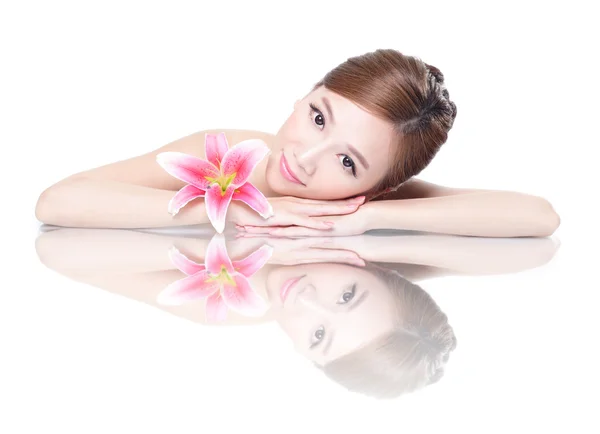 Beauty woman face with flower — Stock Photo, Image