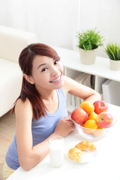 Cheerful woman eat breakfast — Stock Photo, Image