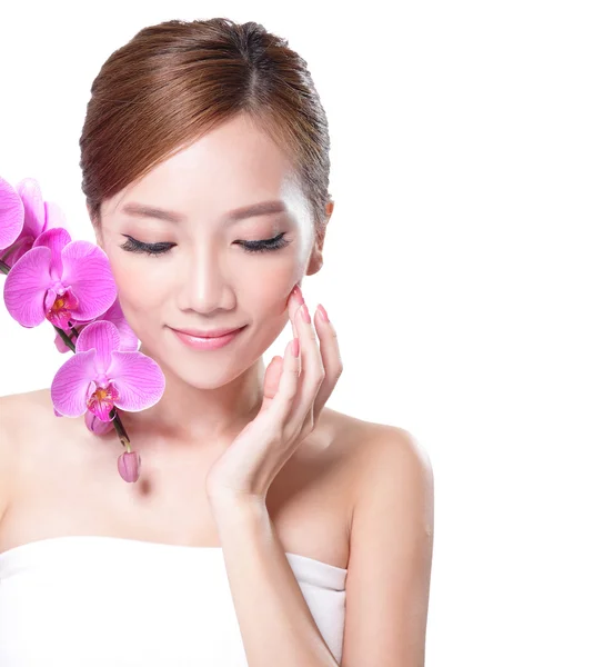 Face with pink orchids — Stock Photo, Image