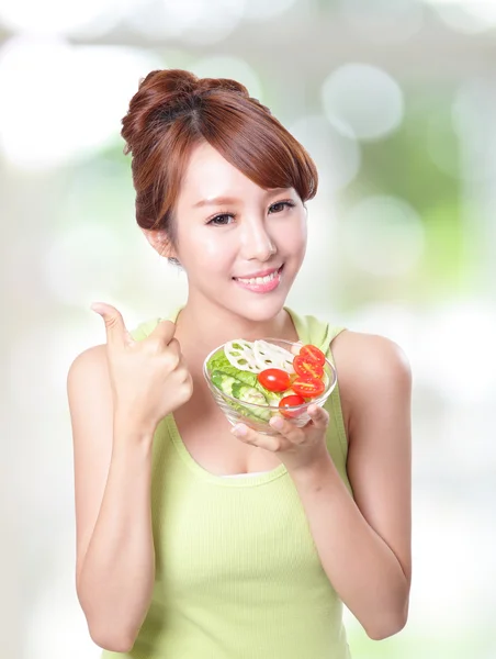 Attractive woman smile eating salad — Stock Photo, Image