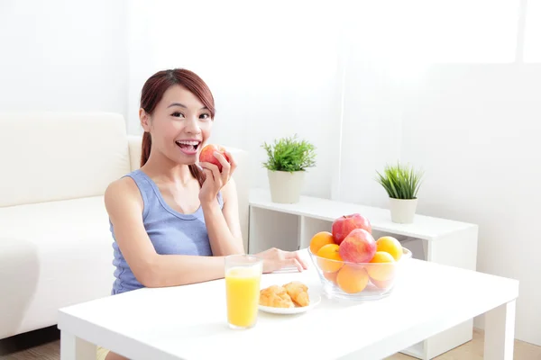 Cheerful woman eat breakfast — Stock Photo, Image