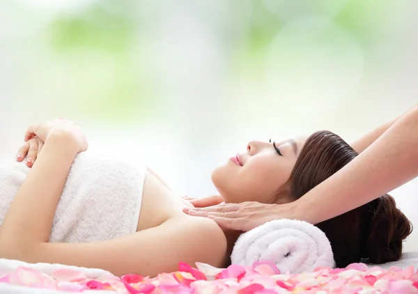 Beautiful woman receiving massage — Stock Photo, Image