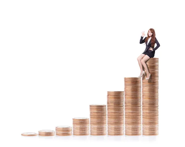 Success business woman sitting on money — Stock Photo, Image