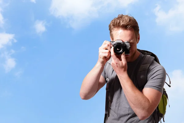 Young man taking photo — Stock Photo, Image