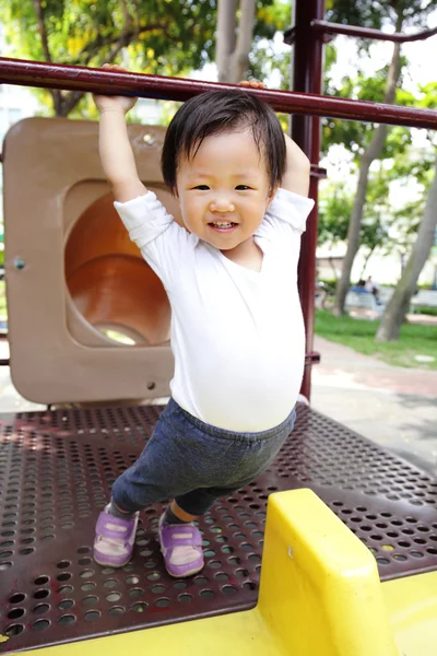 Happy child play on playground — Stock Photo, Image