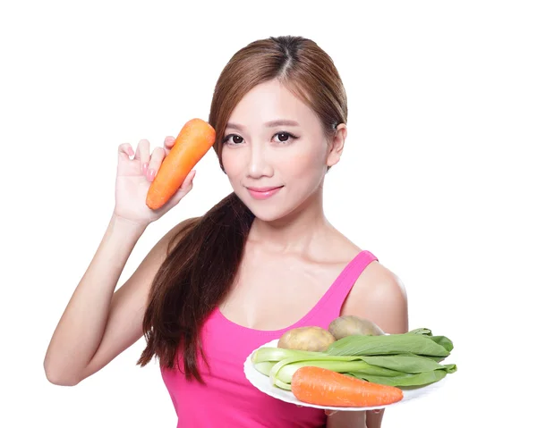 Woman holding vegetables — Stock Photo, Image