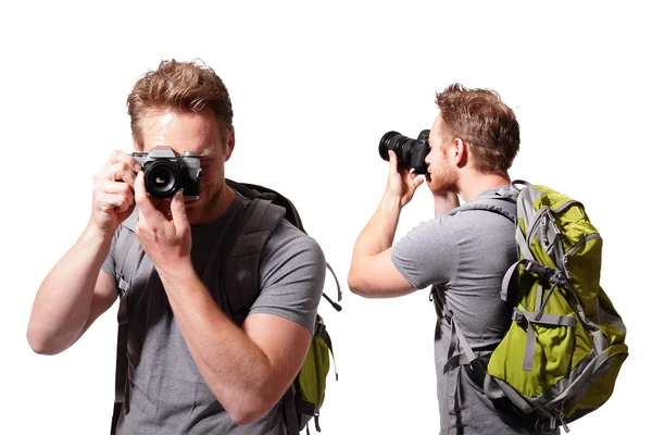 Turista usando câmera com mochila — Fotografia de Stock