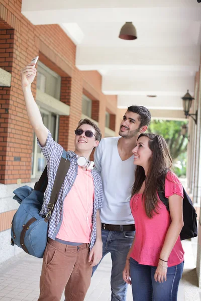 Group of happy friends taking selfie — Stock Photo, Image