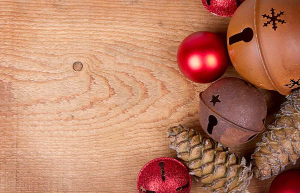 Christmas ornaments on wood panel — Stock Photo, Image